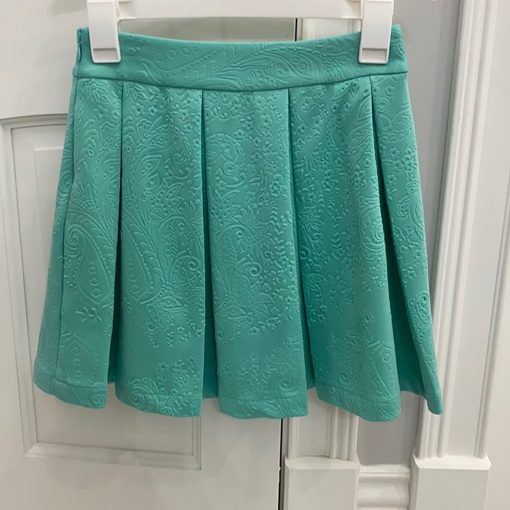 Pleated mini skirt